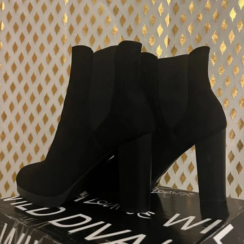 Platform heel boots black size 8.5